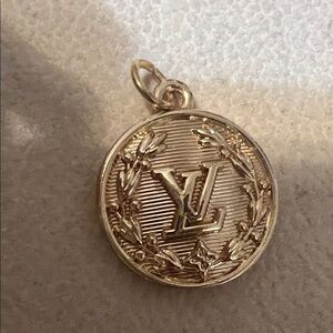 Gold Pendant with Engraved Design